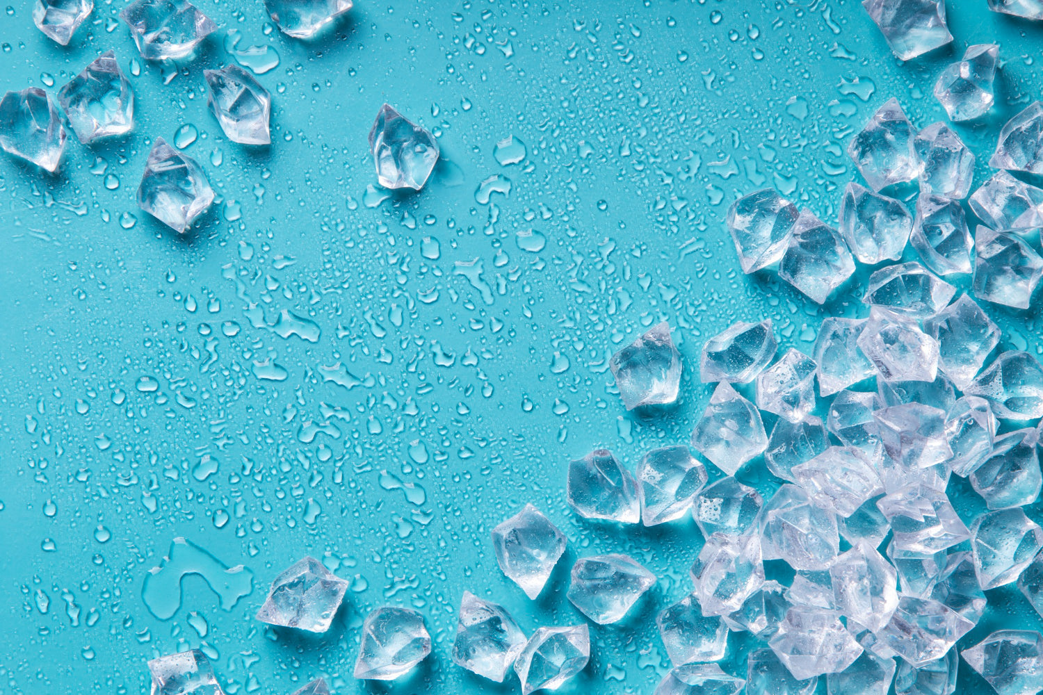 Ice cubes on a blue surface